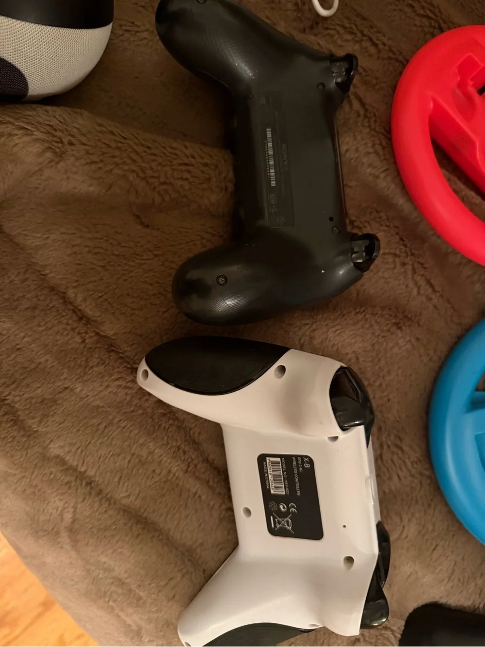Assorted Video Game Controllers and Accessories - Blue, Red, White, Black